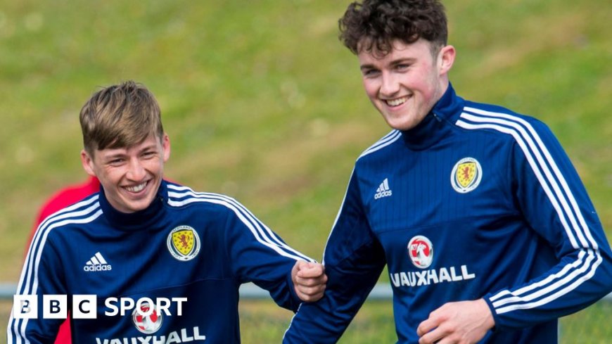 Gauld & Souttar - childhood friends reunited in dark blue