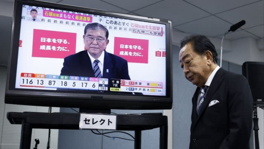 Japanese voters strip LDP coalition of parliamentary majority