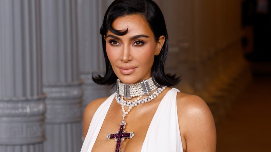 Kim Kardashian Unveils Travis Barker-Produced Take on ‘Santa Baby’