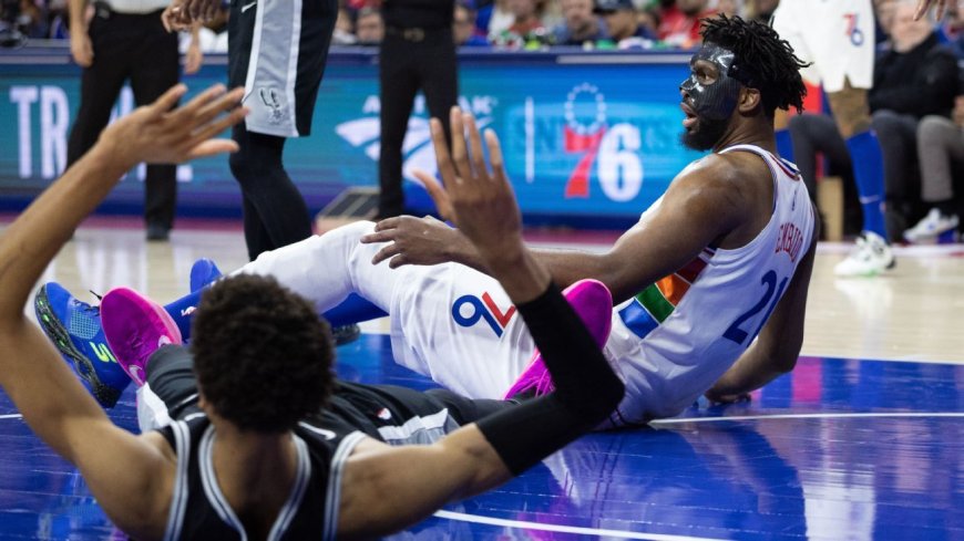 Embiid ejected in chaotic opening half in Philly